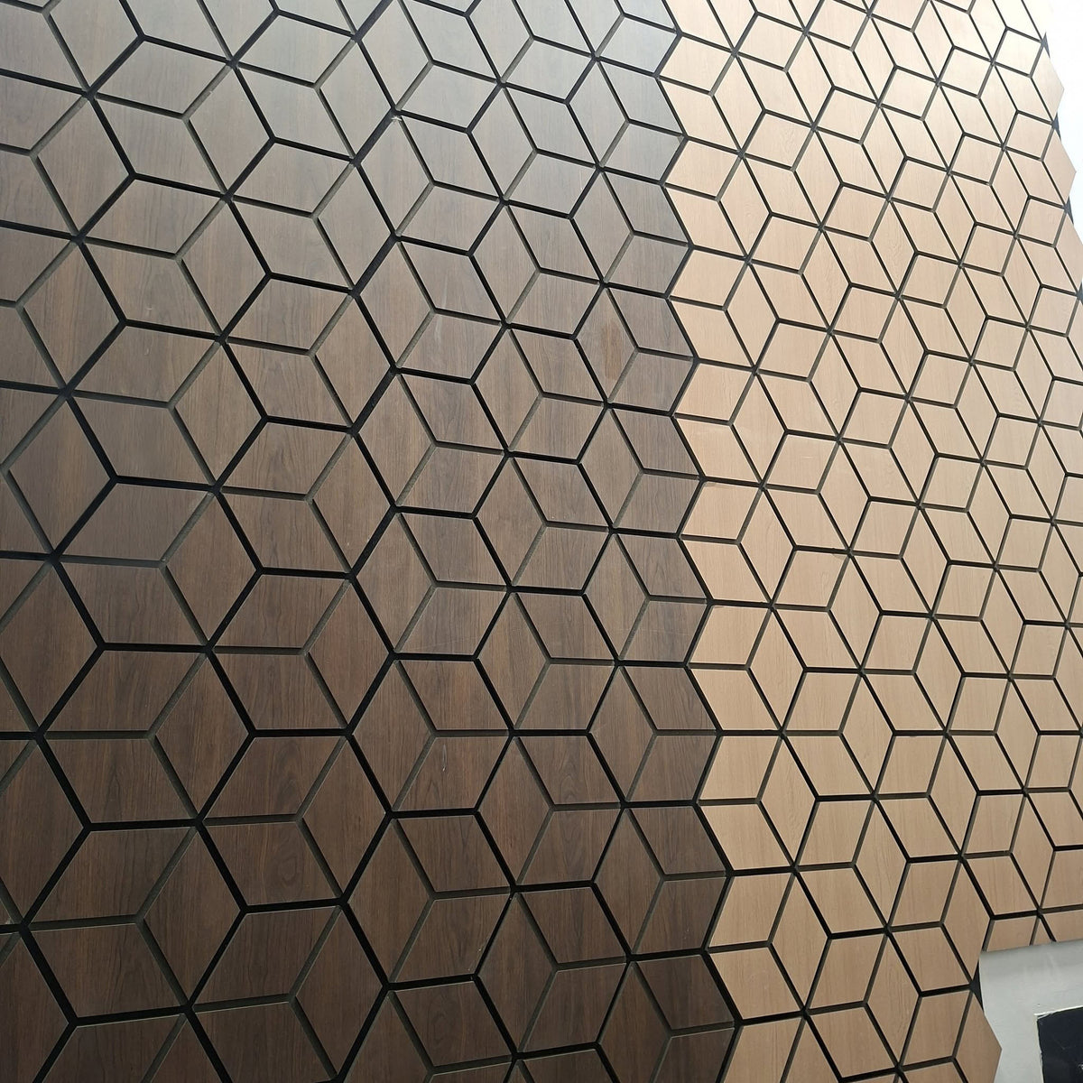 Walnut blocks premium acoustic wall panels by The Panel Outlet Ireland, 60 x 240cm, showing textured walnut finish and installation on wall.