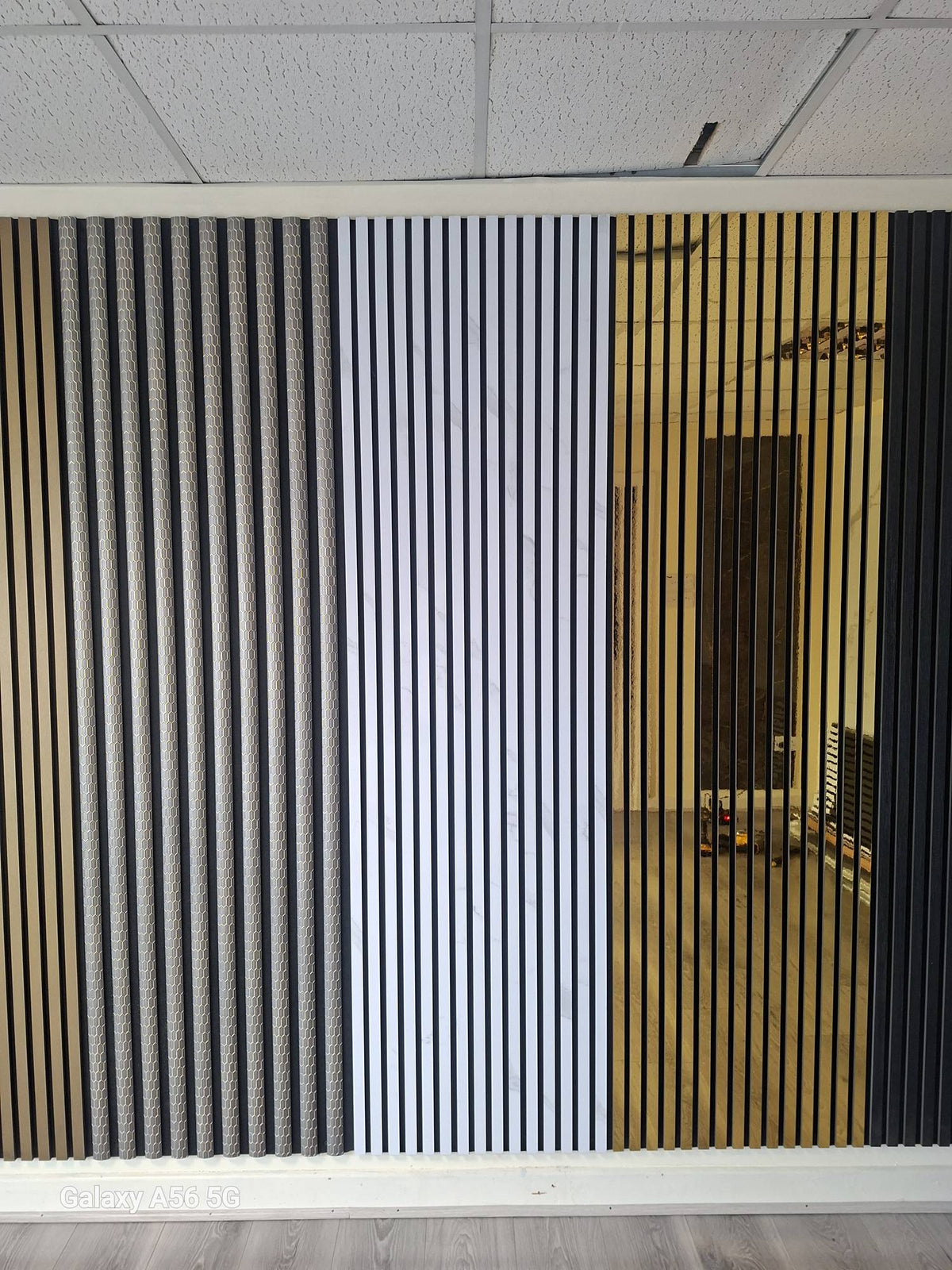 White marble effect acoustic wall panel from The Panel Outlet Ireland, 60x240cm, with fluted design for stylish soundproofing.